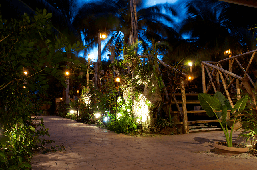 Romantic garden in classy Italian restaurant on Caye Caulker