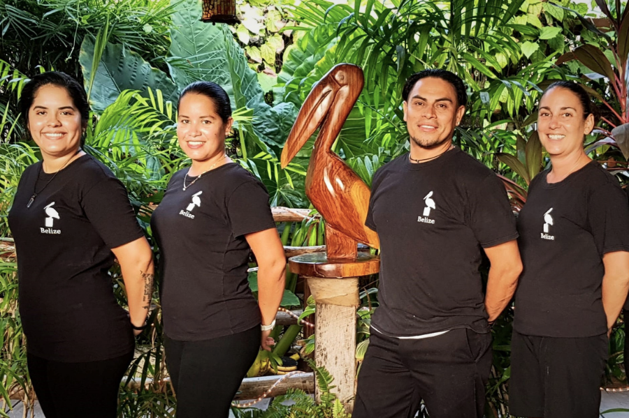 Professional waiting staff at Il Pellicano restaurant, Caye Caulker